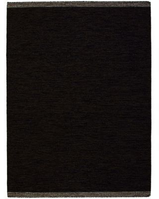 Bildexempel Öland 170x230cm handvävd svart enfärgad ullmatta hos Nessims 